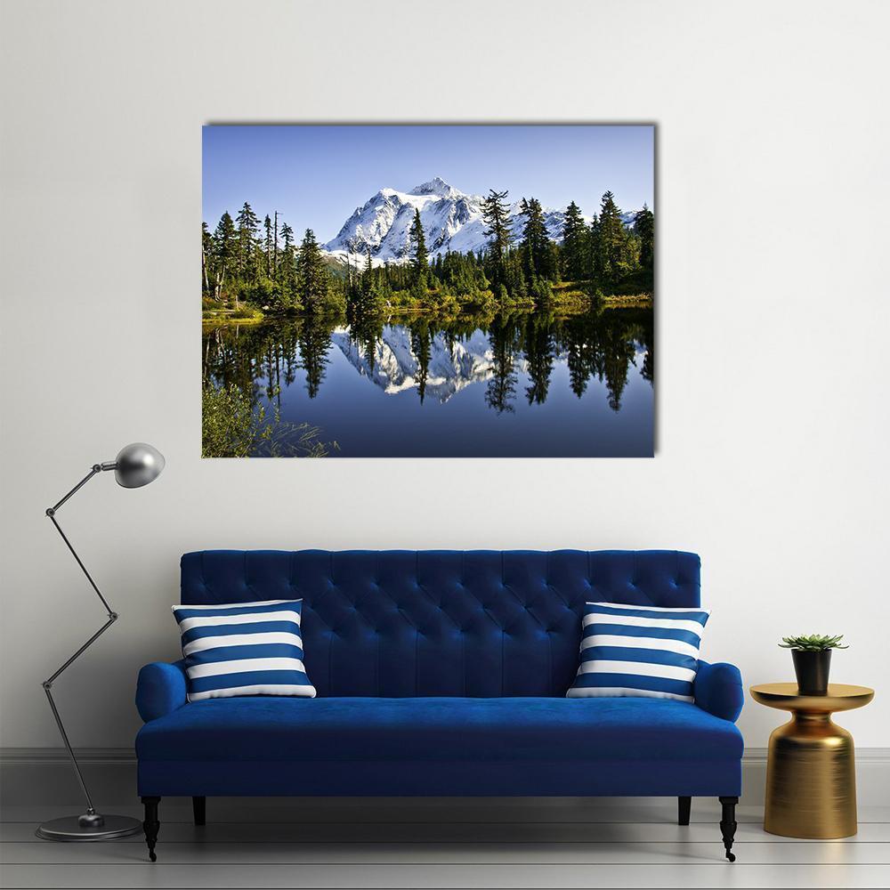 Mount Baker Reflected in Lake Canvas Wall Art in white, green and blue, single panel hung on a wall