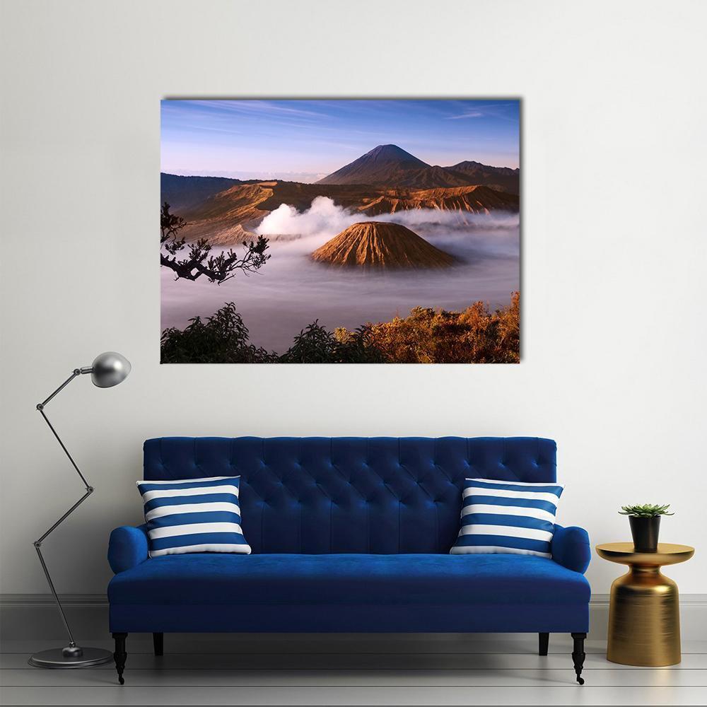 Mount Bromo at Sunrise Canvas Wall Art in brown, orange and blue, single panel hung on a wall
