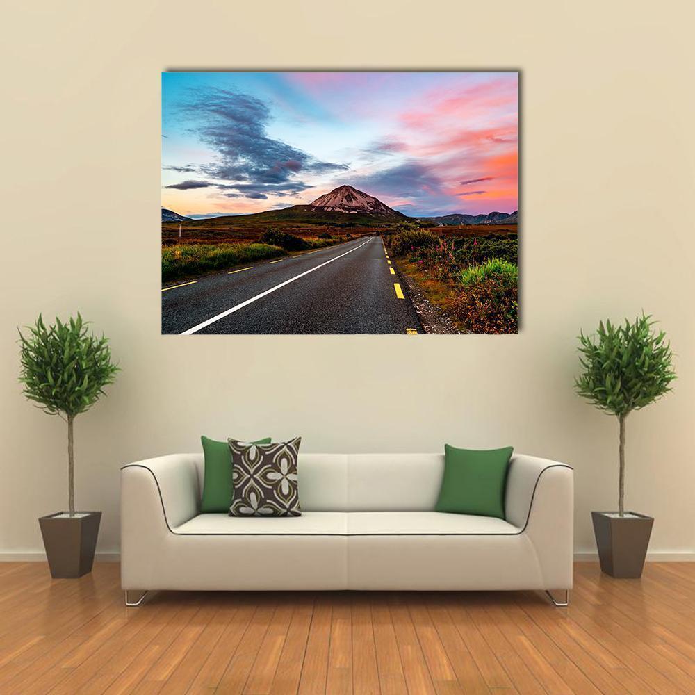 Mount Errigal at Sunset Canvas Wall Art in orange, blue and pink, single panel hung on a wall