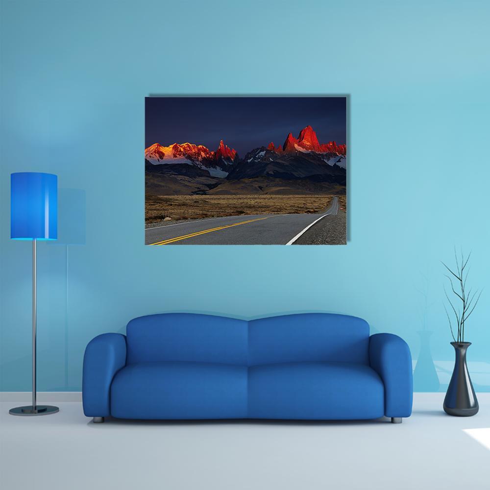 Mount Fitz Roy at Sunrise Canvas Wall Art in gray, orange and blue, single panel hung on a wall