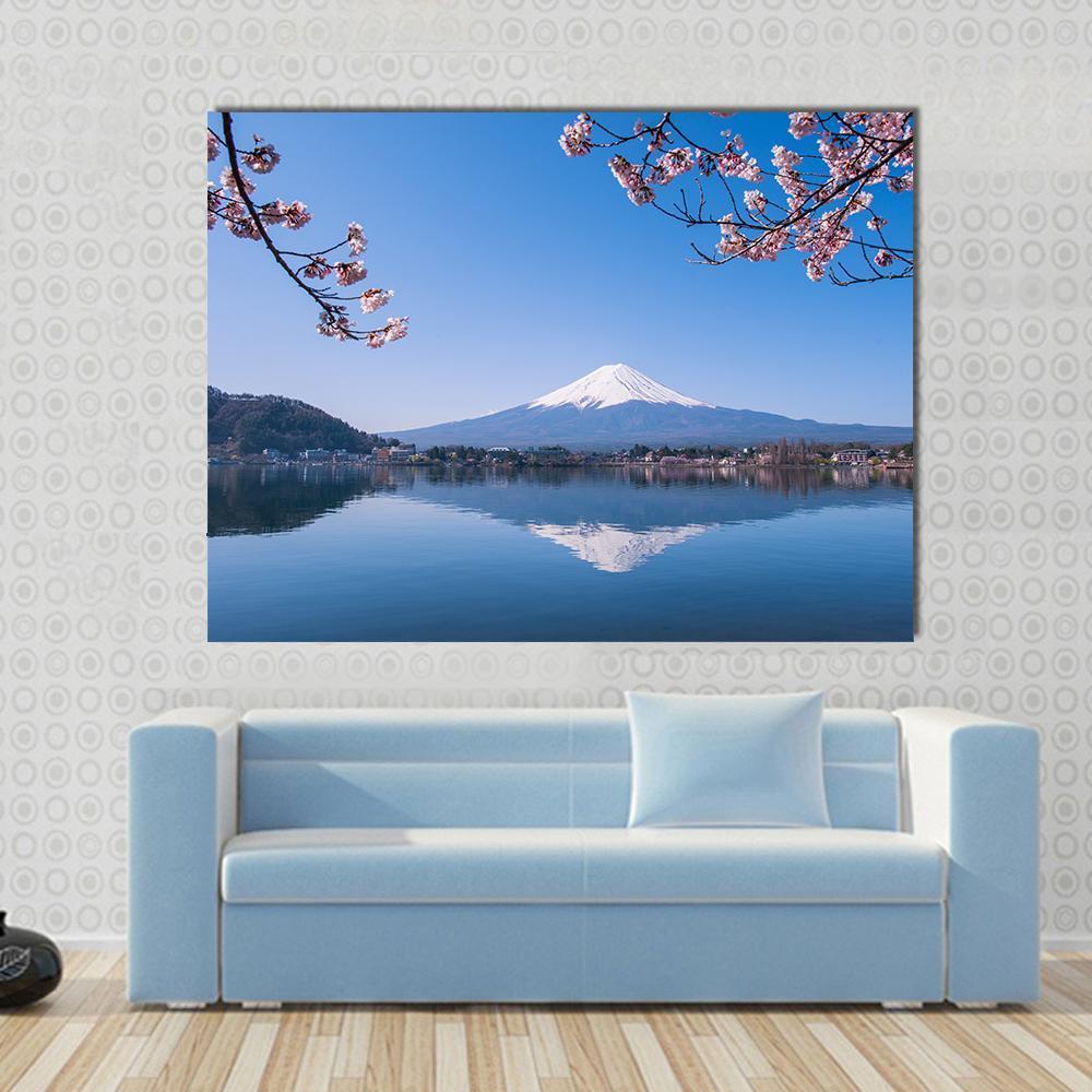 Mount Fuji and Cherry Tree Canvas Wall Art in white, blue and pink, single panel hung on a wall