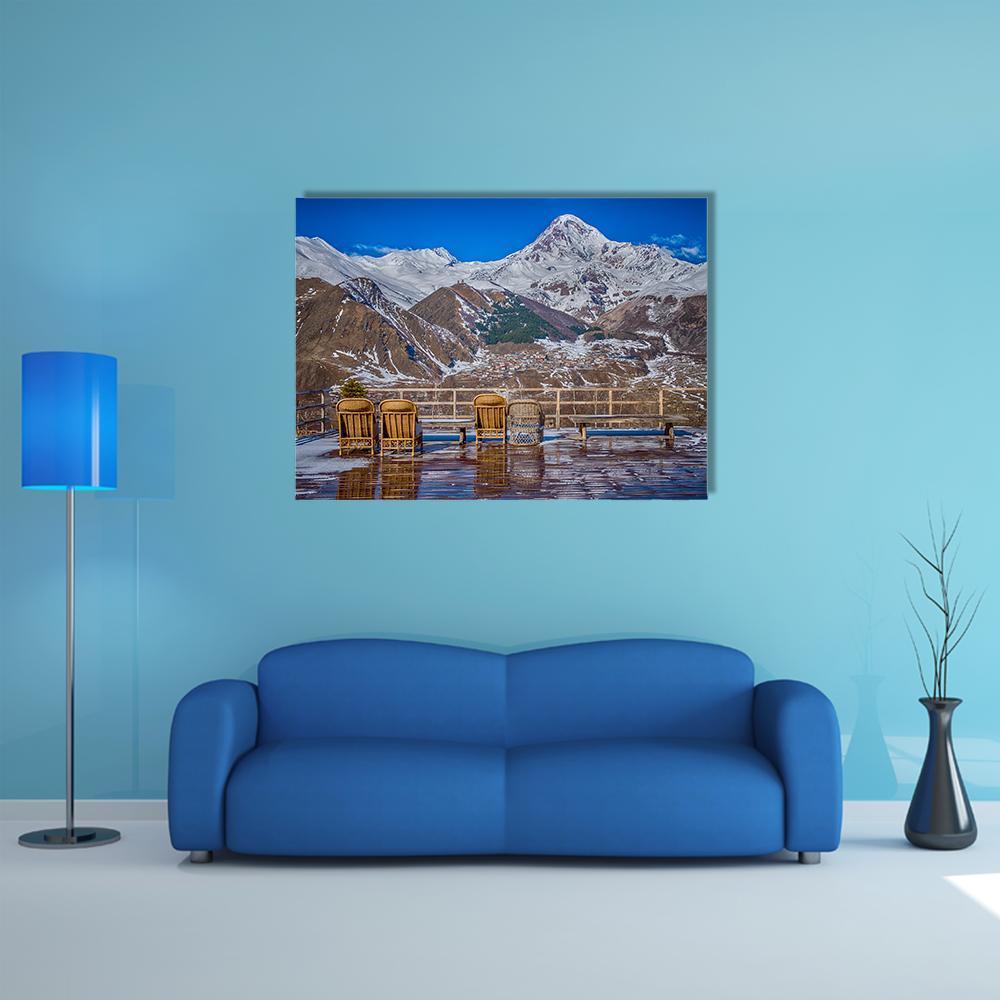 Mount Kazbek in Georgia Canvas Wall Art in white, brown and blue, single panel hung on a wall