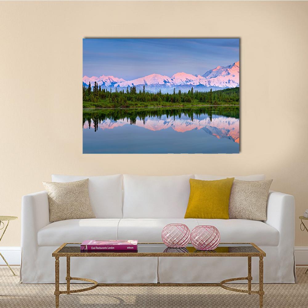 Wonder Lake Reflection Canvas Wall Art in white, blue and pink, single panel hung on a wall