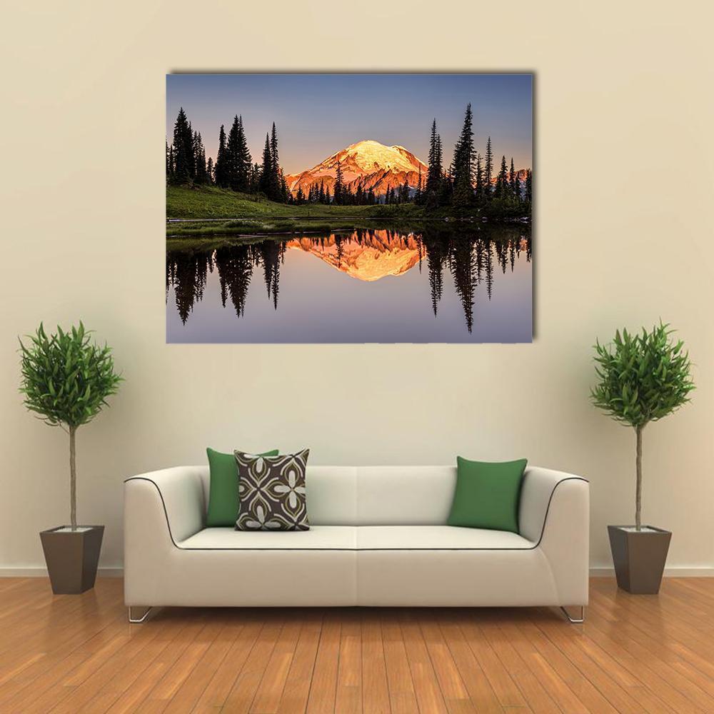 Mount Rainier Sunset Reflection Canvas Wall Art in black, orange and blue, single panel hung on a wall