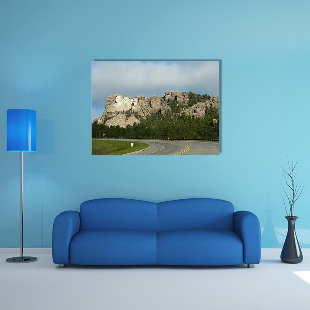 Mount Rushmore in Dakota Canvas Wall Art in gray, green and blue, single panel hung on a wall