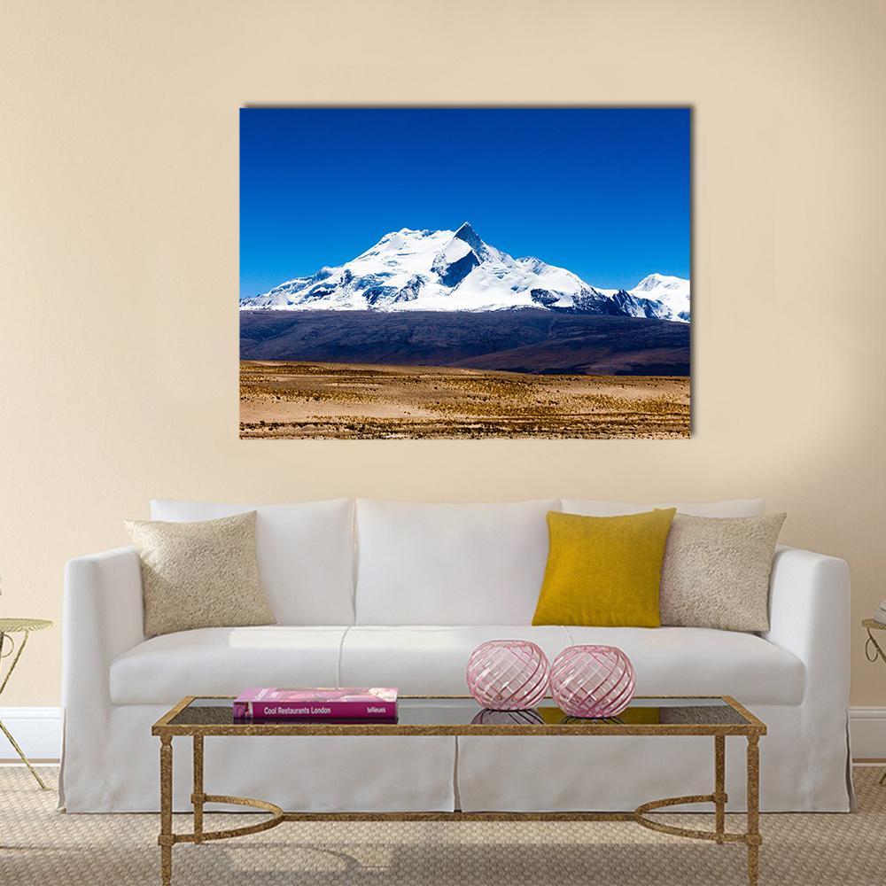 Mt Shishapangma Snow-capped Peaks Canvas Wall Art in white, brown and blue, single panel hung on a wall
