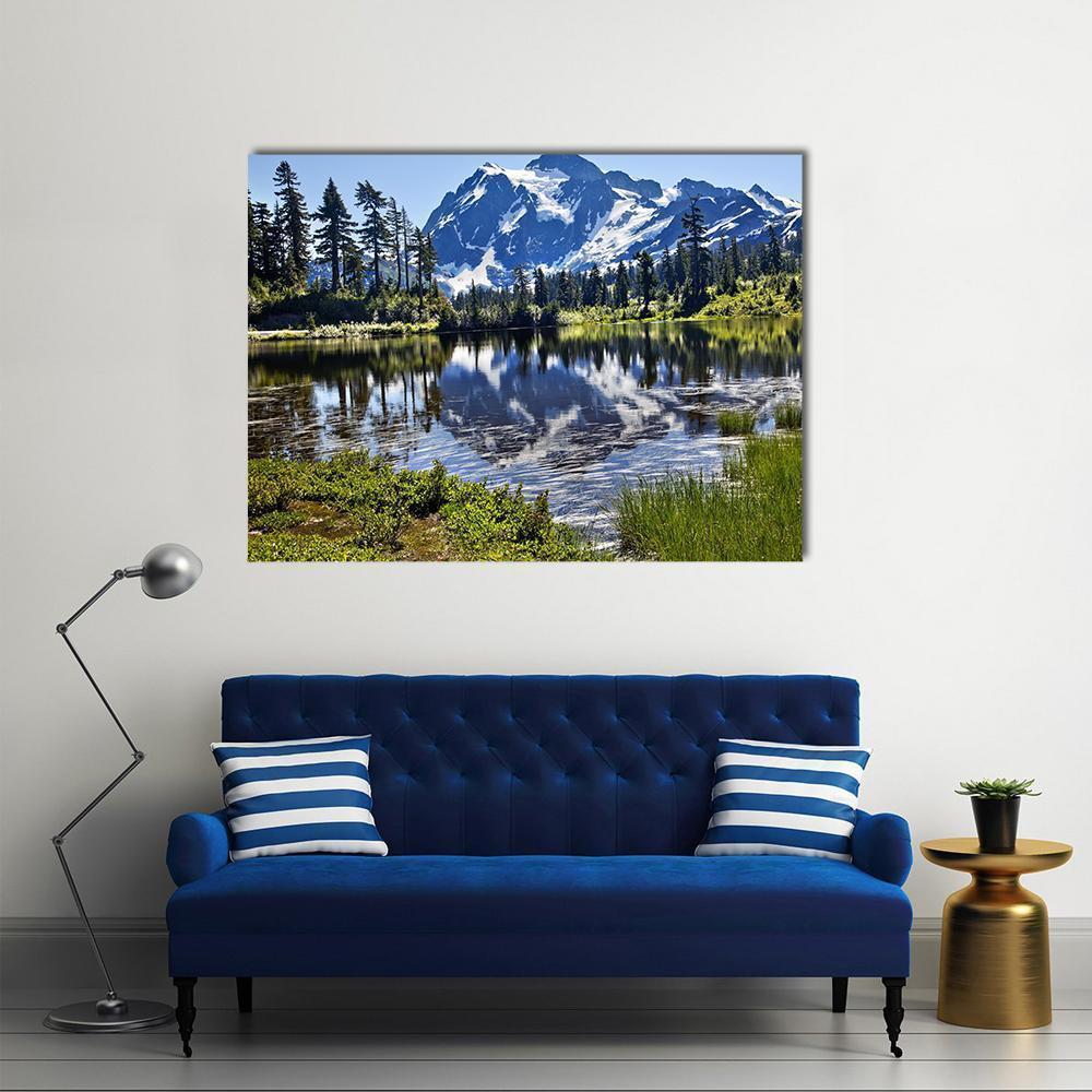Mount Shuksan with Lake Reflection Canvas Wall Art in white, green and blue, single panel hung on a wall