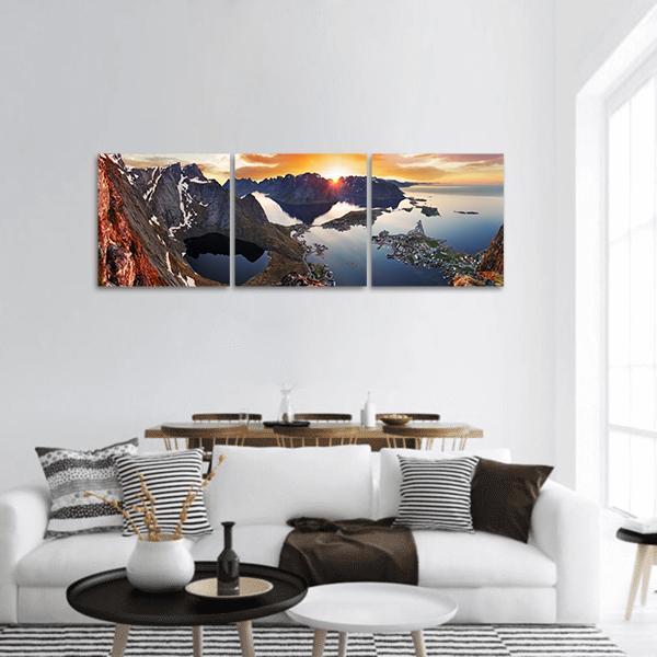 Norway Mountain Coast at Sunrise Panoramic Canvas Wall Art in brown, orange and blue, hung on a wall
