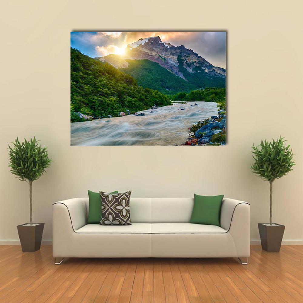 Fitzroy Mountain and River Canvas Wall Art in white, green and blue, single panel hung on a wall
