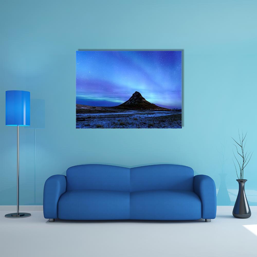 Kirkjufell and Aurora Borealis Canvas Wall Art in black, blue and purple, single panel hung on a wall