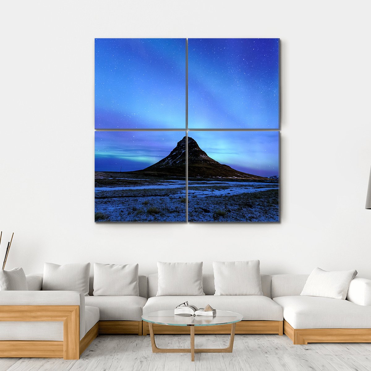 Kirkjufell Mountain and Aurora Borealis Canvas Wall Art in black, blue and purple, hung on a wall