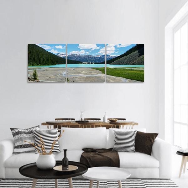 Lake Louise View in Banff National Park Panoramic Canvas Wall Art in gray, green and blue, hung on a wall