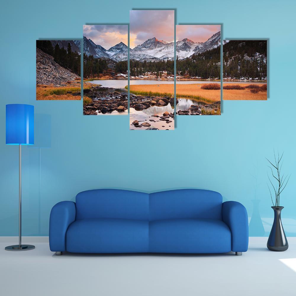 Siberian Mountain at Sunset Canvas Wall Art in gray, orange and blue, 5 panel Star layout hung on a wall