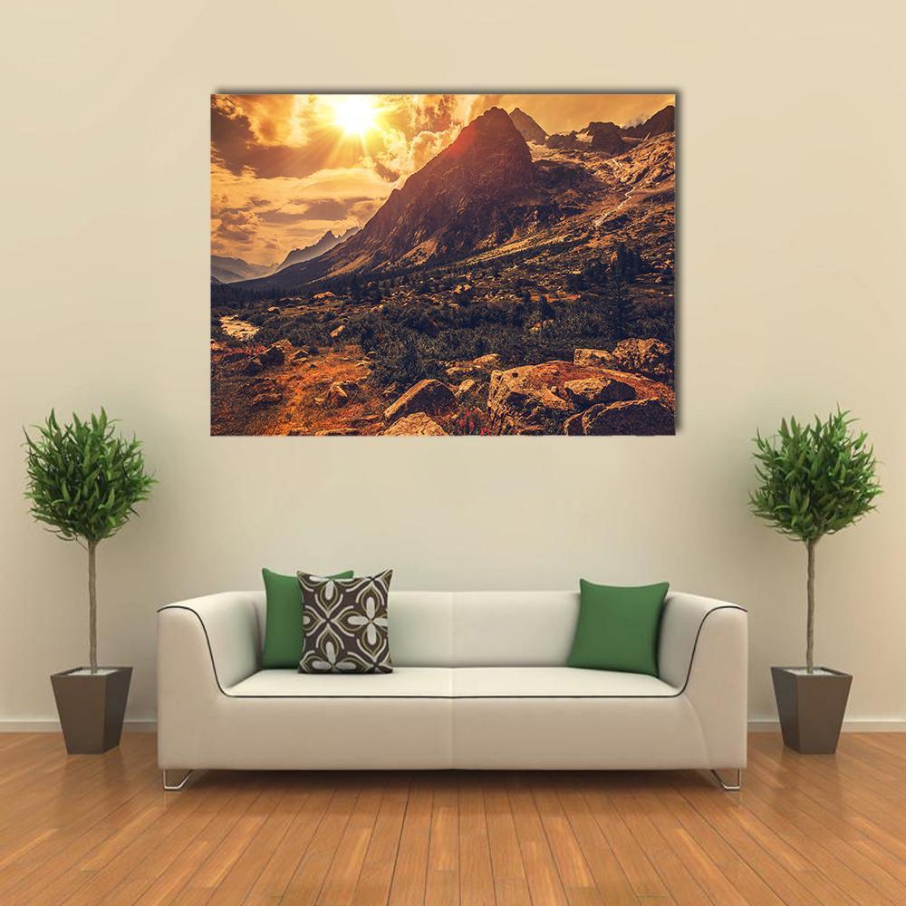 Mountain Landscape at Sunset Canvas Wall Art in brown, orange and yellow, single panel hung on a wall