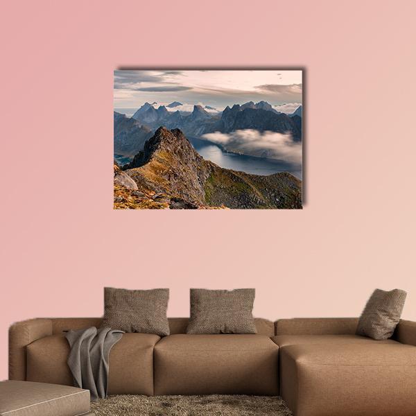 Rocky Peak Above Foggy Mountain Lake Canvas Wall Art in gray, brown and blue, single panel hung on a wall