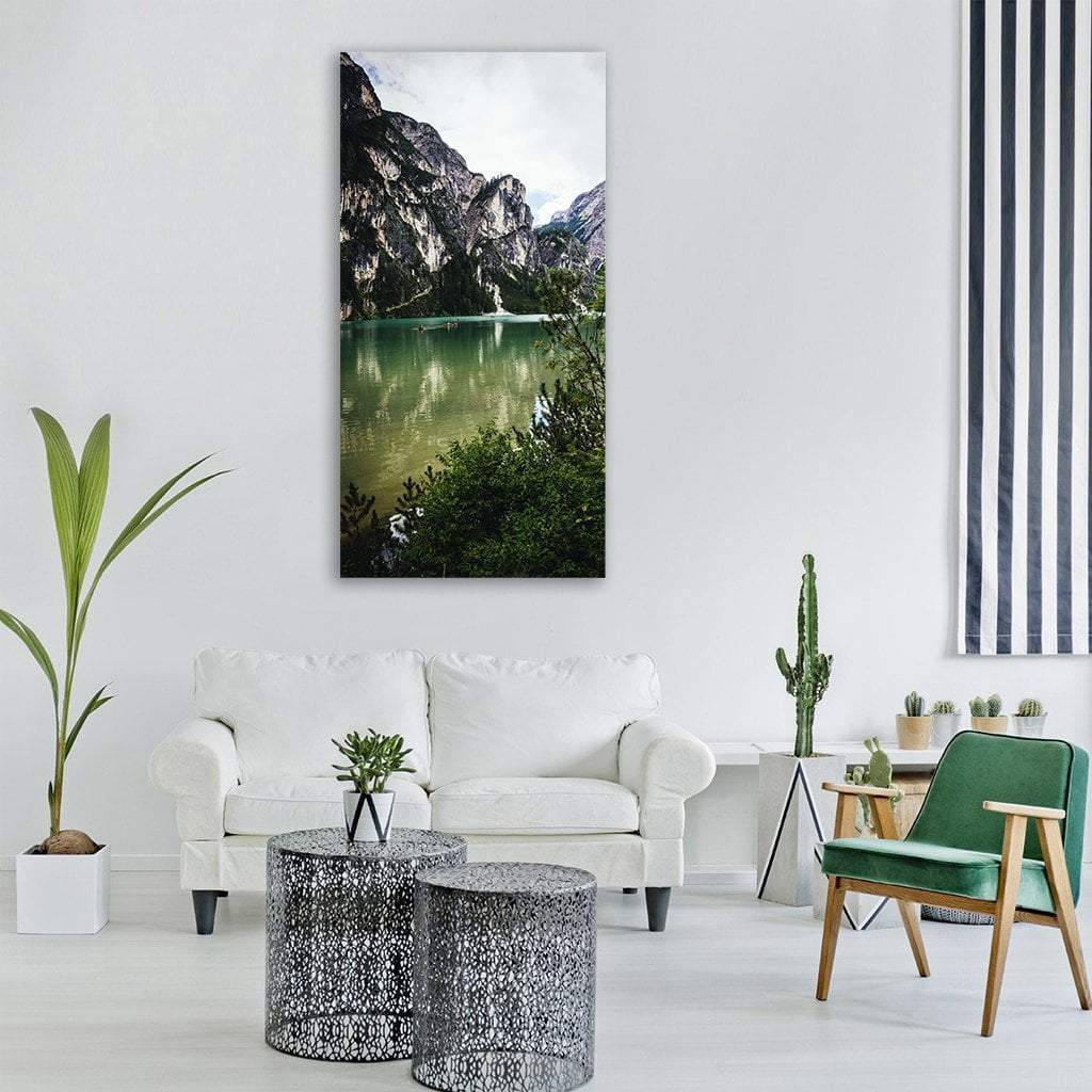 Mountain Lake and Trees Vertical Canvas Wall Art in white, gray and green, single vertical panel hung on a wall