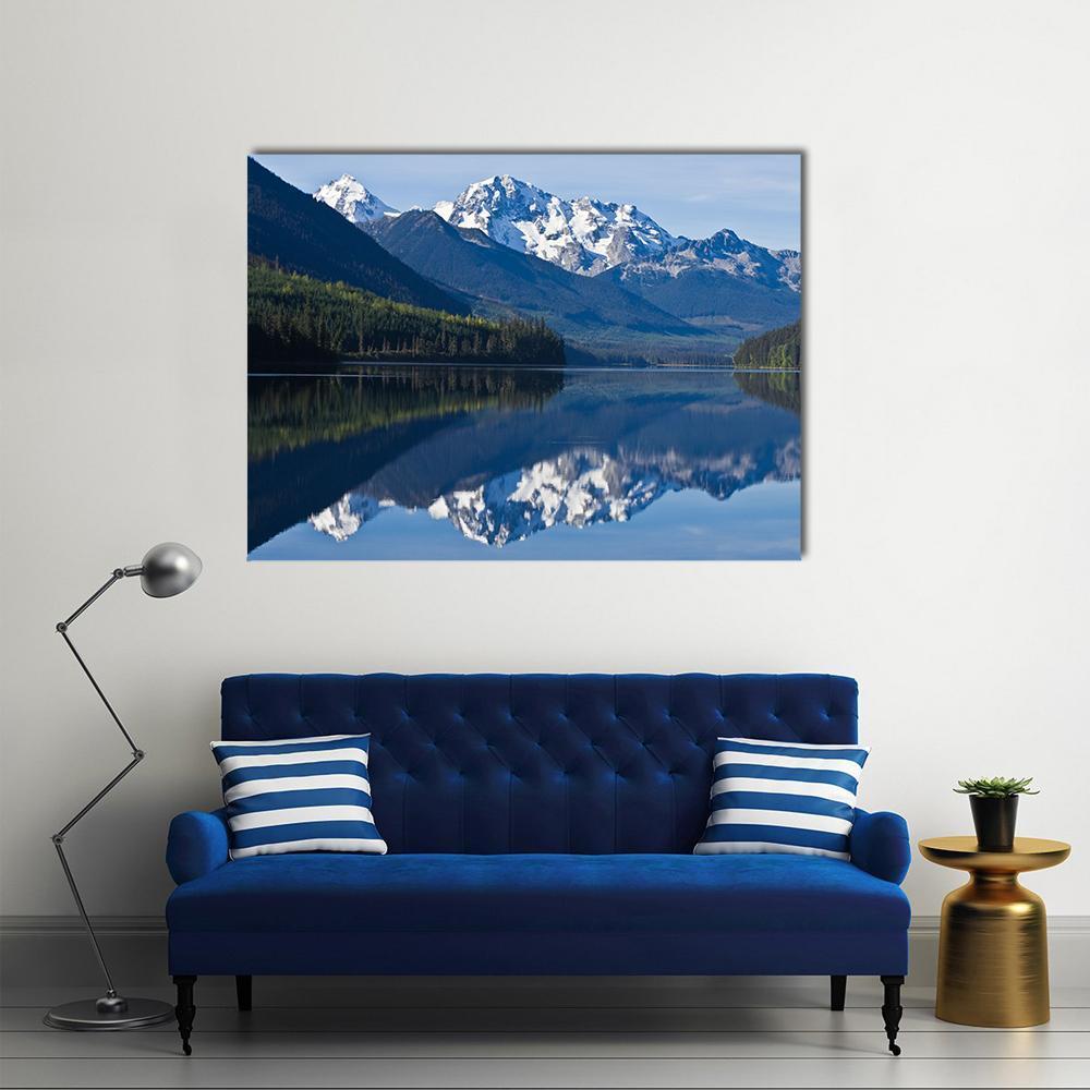 Mountain in British Columbia Canvas Wall Art in white, green and blue, single panel hung on a wall