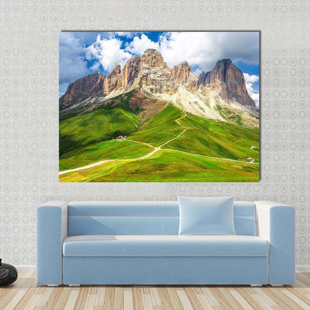 Mountain Range Landscape Canvas Wall Art in brown, green and blue, single panel hung on a wall