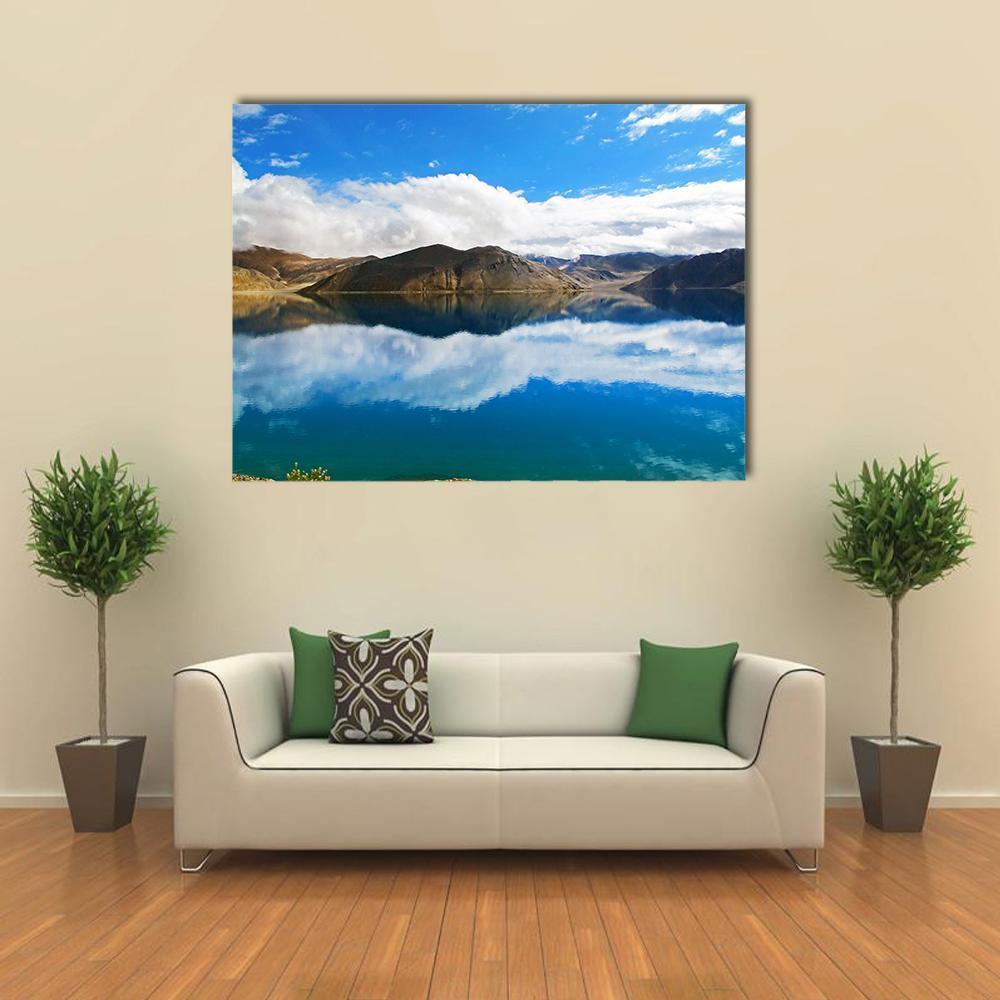 Pangong Tso Lake Reflection Canvas Wall Art in white, brown and blue, single panel hung on a wall