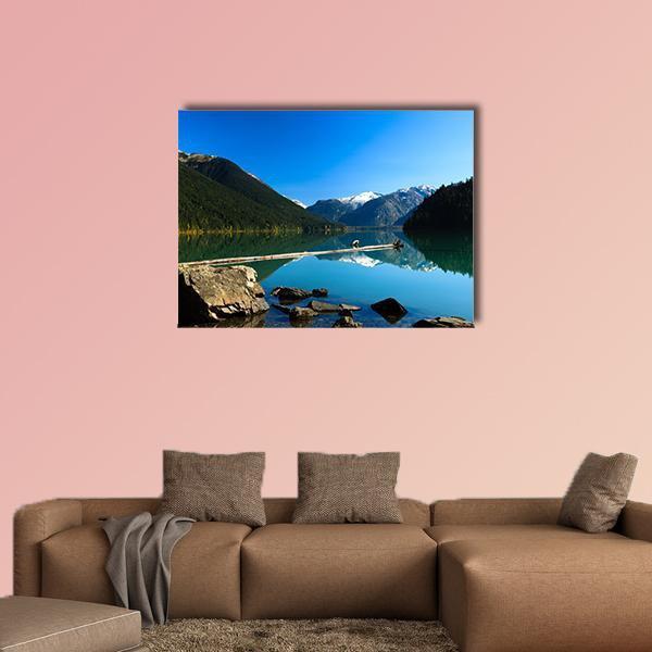 Cheakamus Lake Reflection Canvas Wall Art in green and blue, single panel hung on a wall