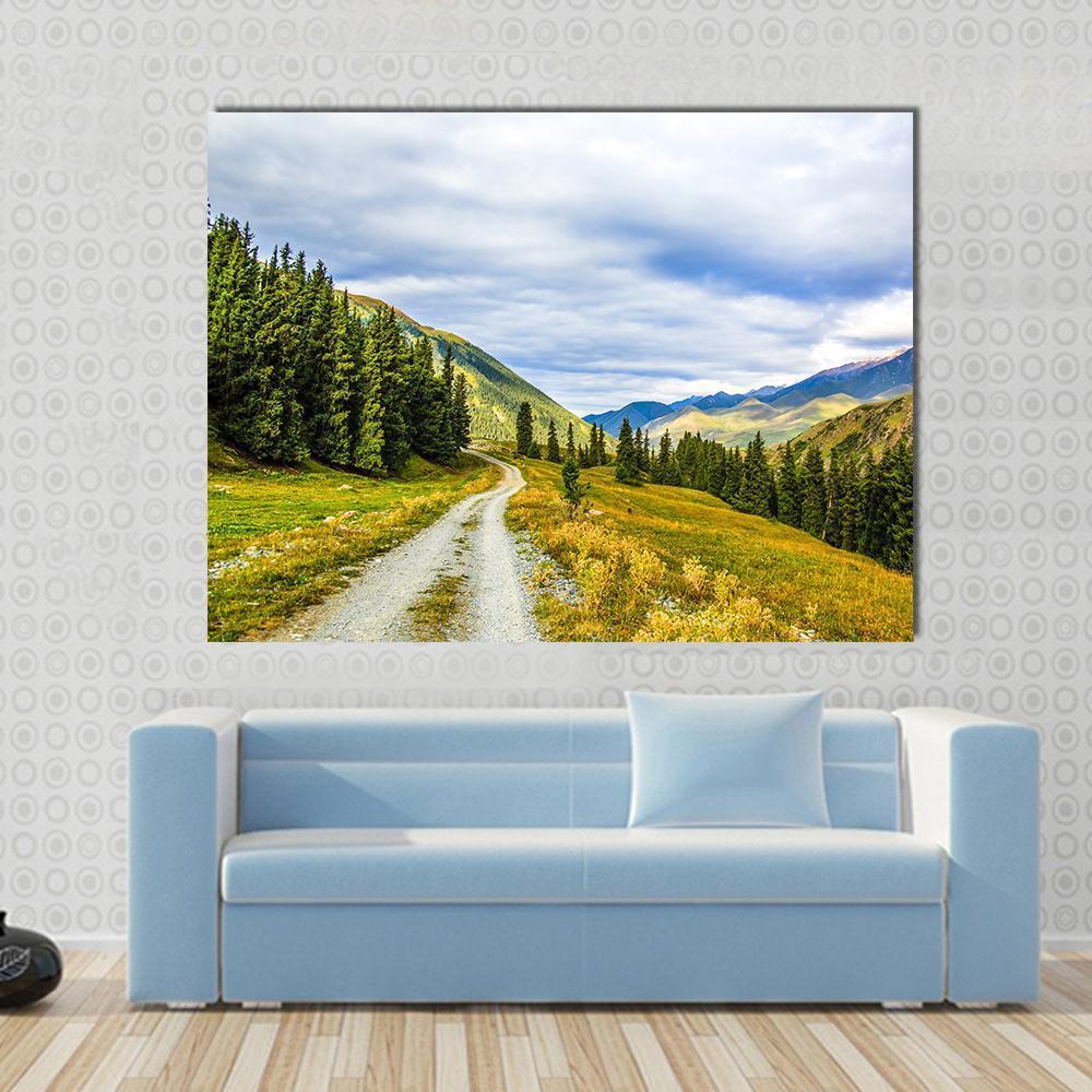 Mountain Road &amp; Landscape Canvas Wall Art in gray, green and blue, single panel hung on a wall
