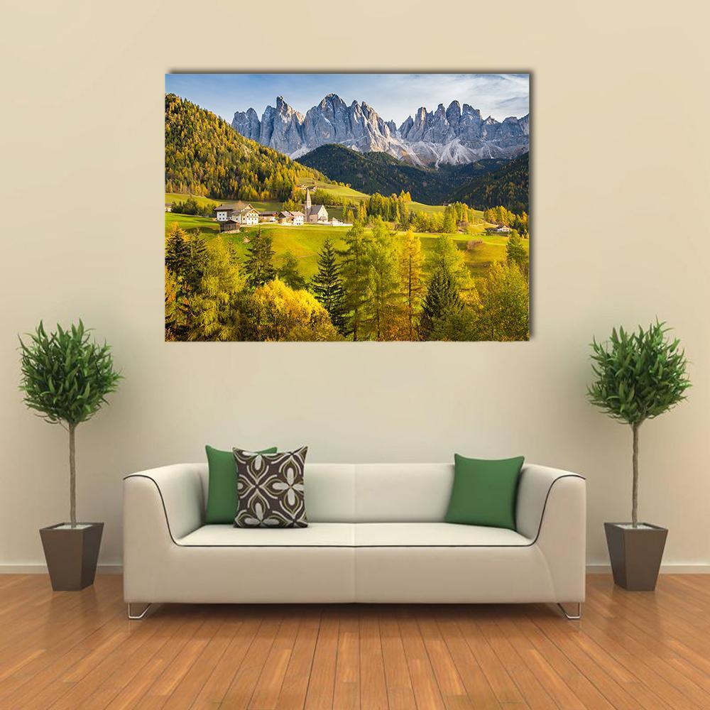 Village in the Dolomites Canvas Wall Art in yellow, green and blue, single panel hung on a wall