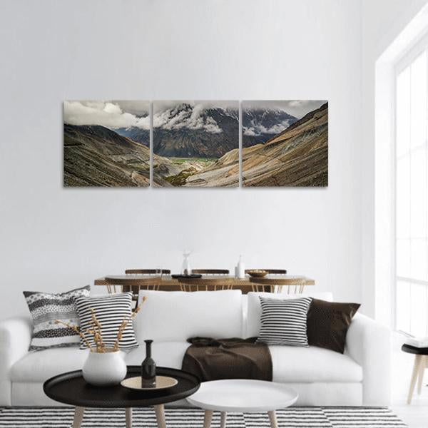 Mastuj River Valley Landscape Panoramic Canvas Wall Art in gray, beige and brown, hung on a wall