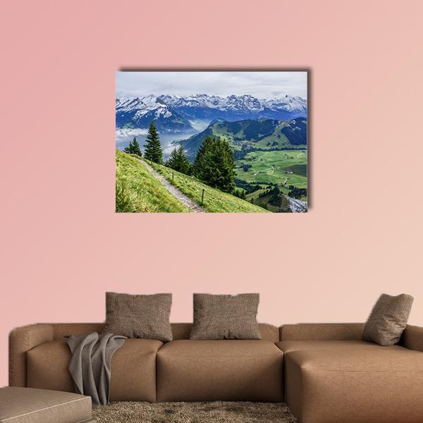 Mountain Walkway with Winding Dirt Path Canvas Wall Art in white, green and blue, single panel hung on a wall