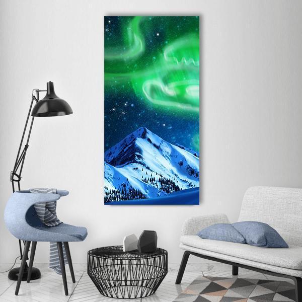 Aurora Borealis Over Snow-capped Peak Vertical Canvas Wall Art in white, green and blue, hung on a wall