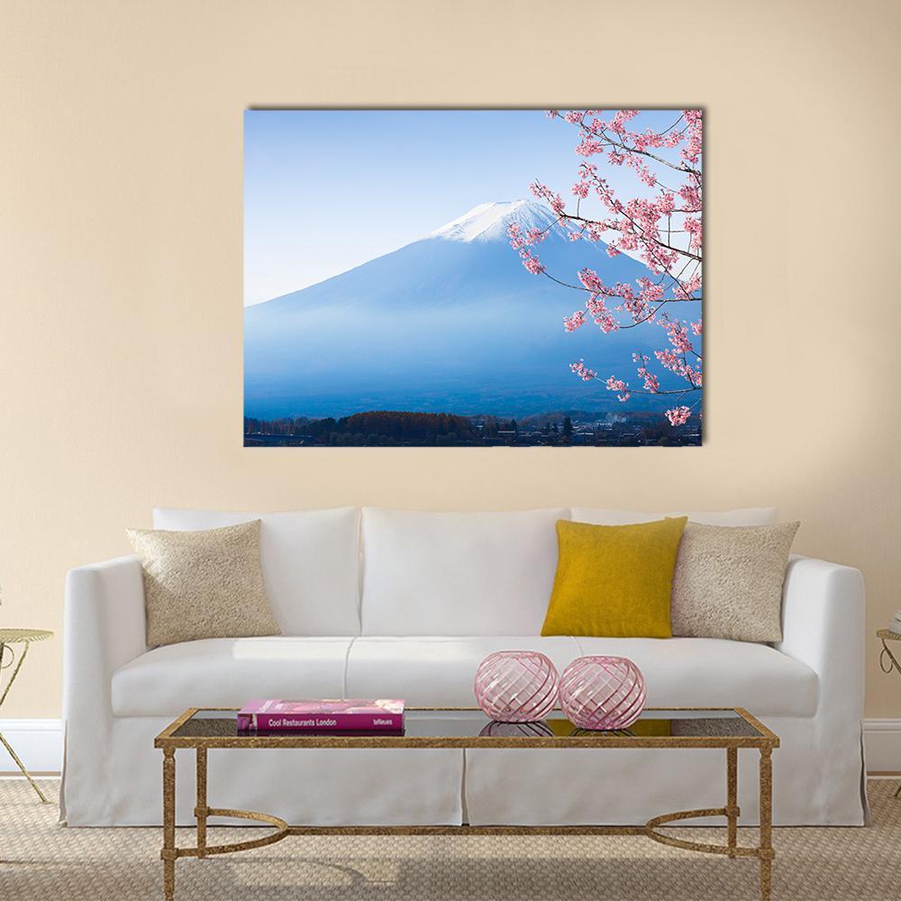 Mount Fuji with Cherry Blossoms Canvas Wall Art in white, blue and pink, single panel hung on a wall