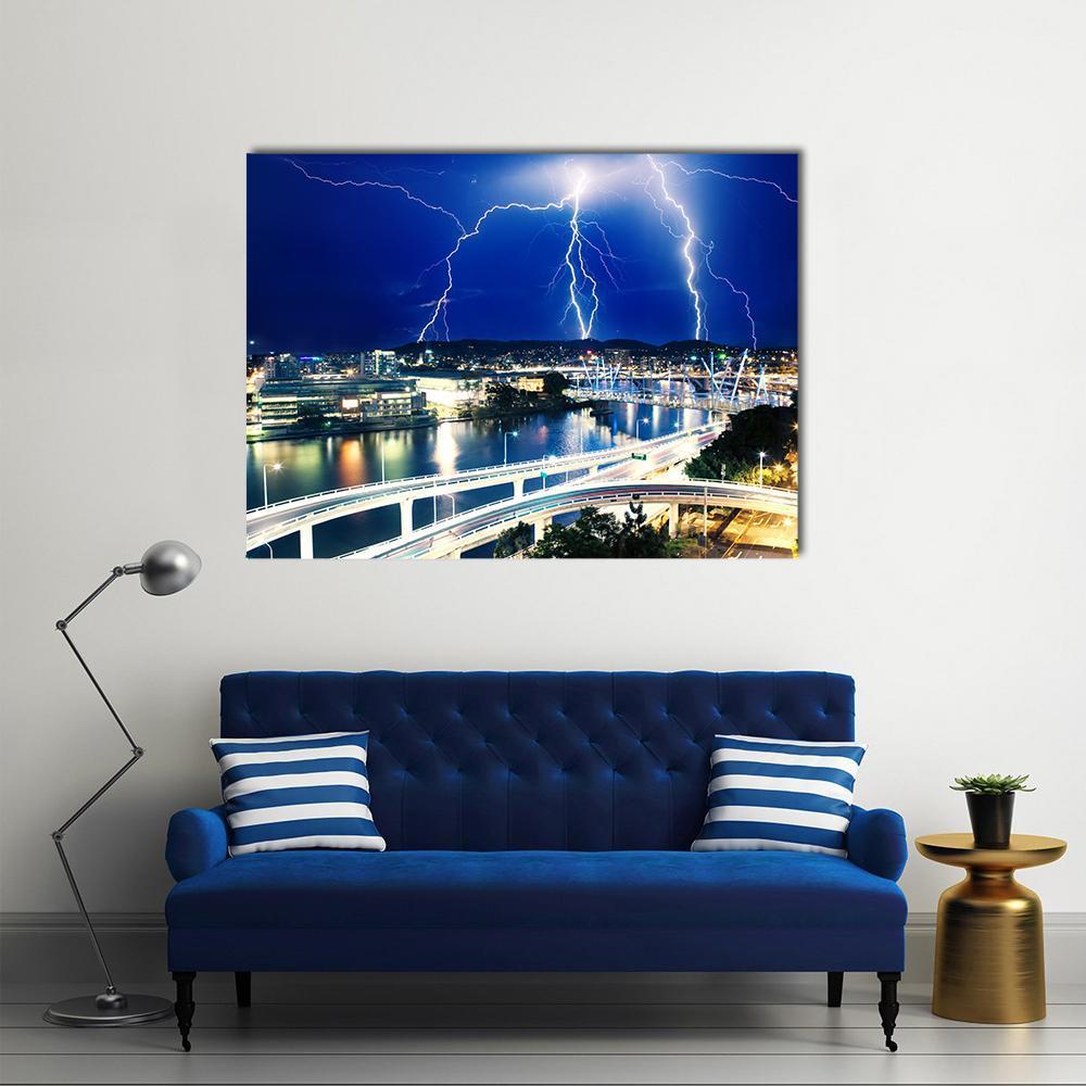 Lightning Strikes Over City River Canvas Wall Art in black, white and blue, single panel hung on a wall