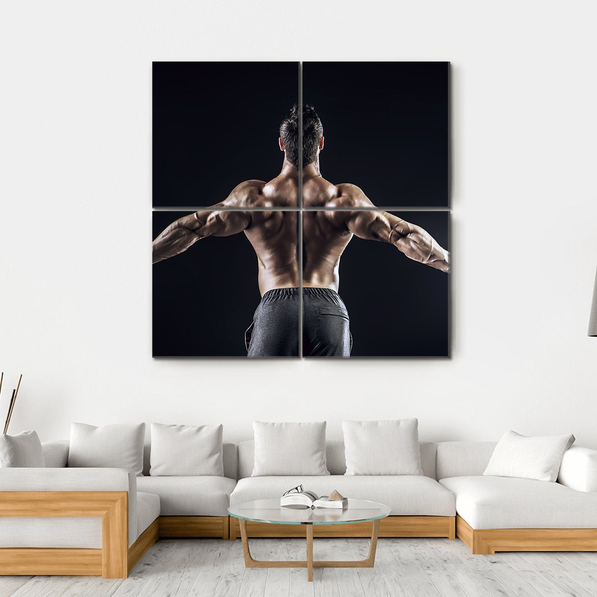Muscular Man with Outspread Arms Canvas Wall Art in black and brown, hung on a wall