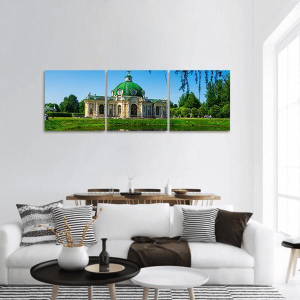 Kuskovo Grotto Pavilion Panoramic Canvas Wall Art in beige, green and blue, hung on a wall