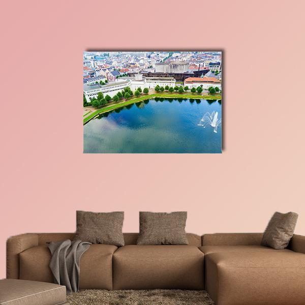 Bergen Museum Aerial Lake View Canvas Wall Art in white, green and blue, single panel hung on a wall