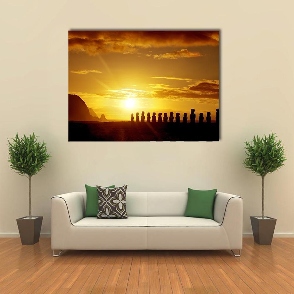 Sunrise at Easter Island Canvas Wall Art in black, orange and yellow, single panel hung on a wall