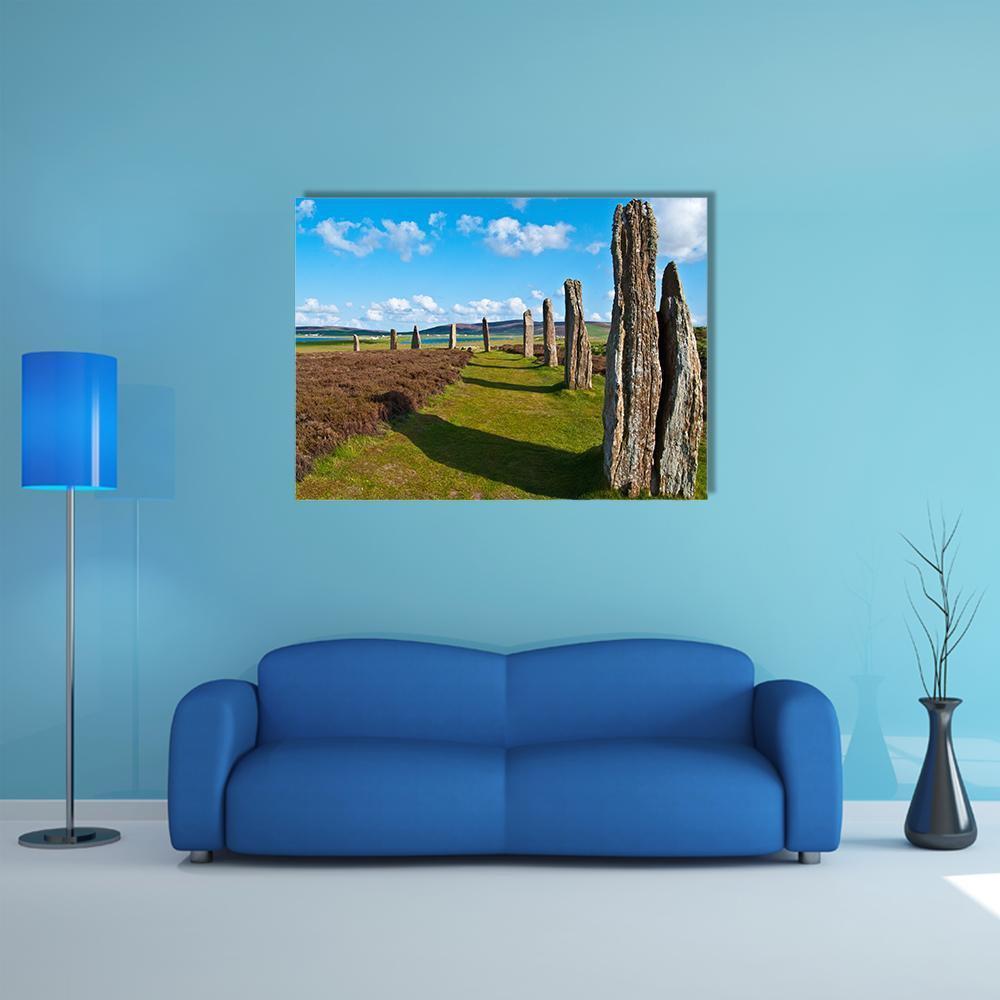 Mystic Ring of Brodgar Canvas Wall Art in brown, green and blue, single panel hung on a wall