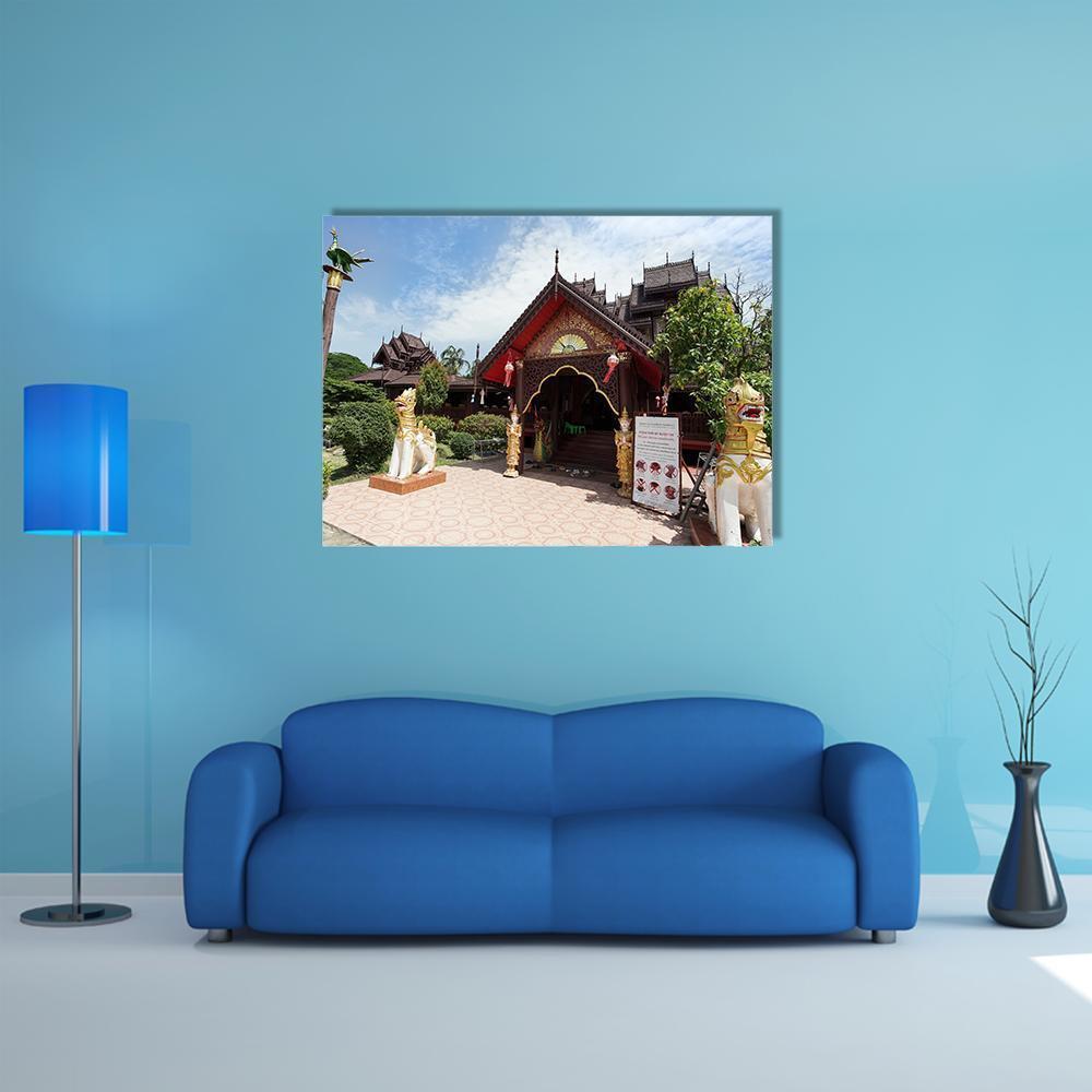 Nantaram Temple, Thailand Canvas Wall Art in brown, gold and blue, single panel hung on a wall