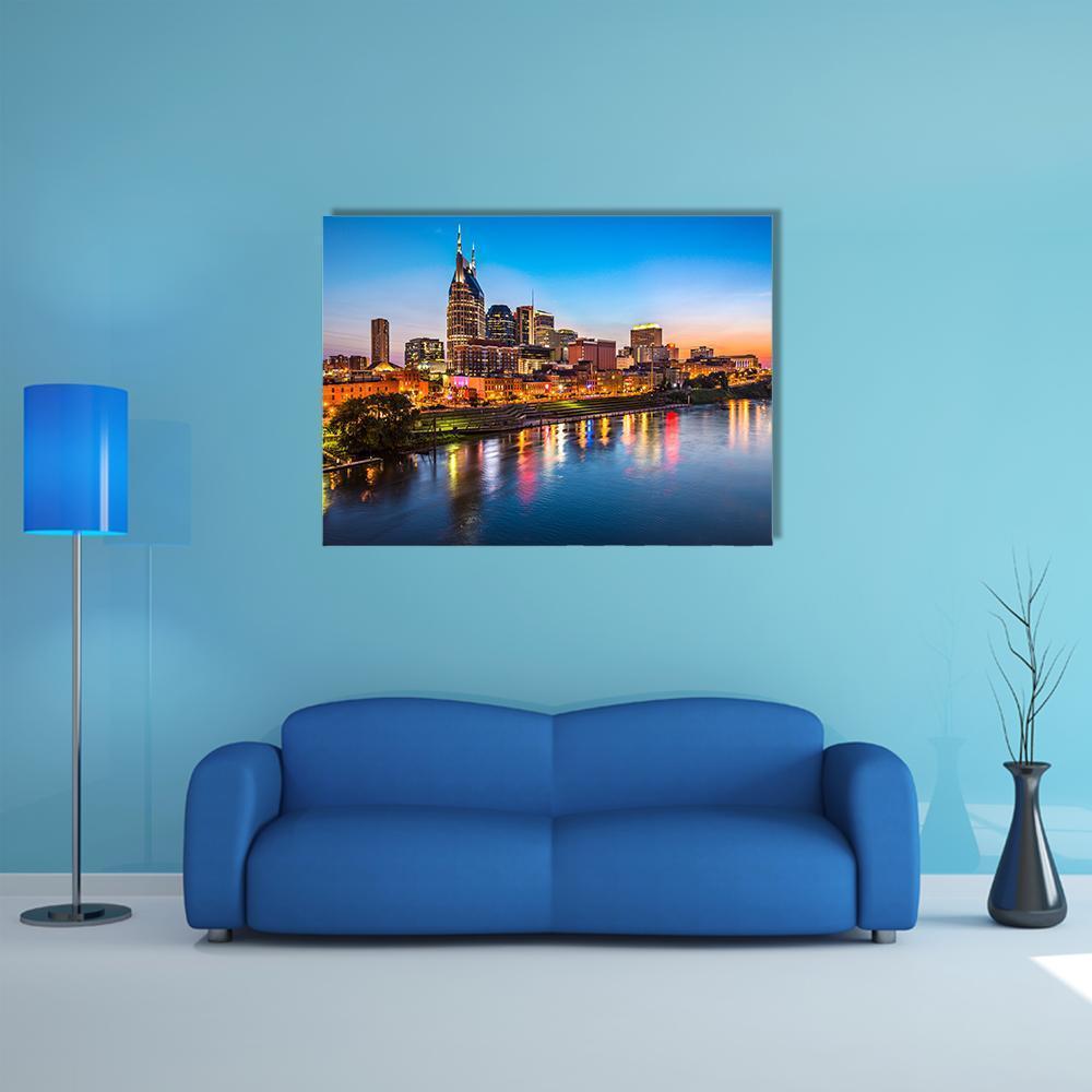 Nashville City Skyline at Sunset Canvas Wall Art in orange, yellow and blue, single panel hung on a wall