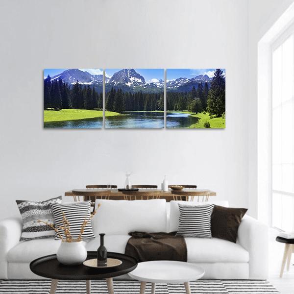 Durmitor National Park Lake and Mountains Panoramic Canvas Wall Art in white, green and blue, hung on a wall