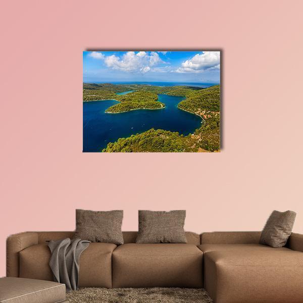 Islands of Mljet National Park Canvas Wall Art in green and blue, single panel hung on a wall