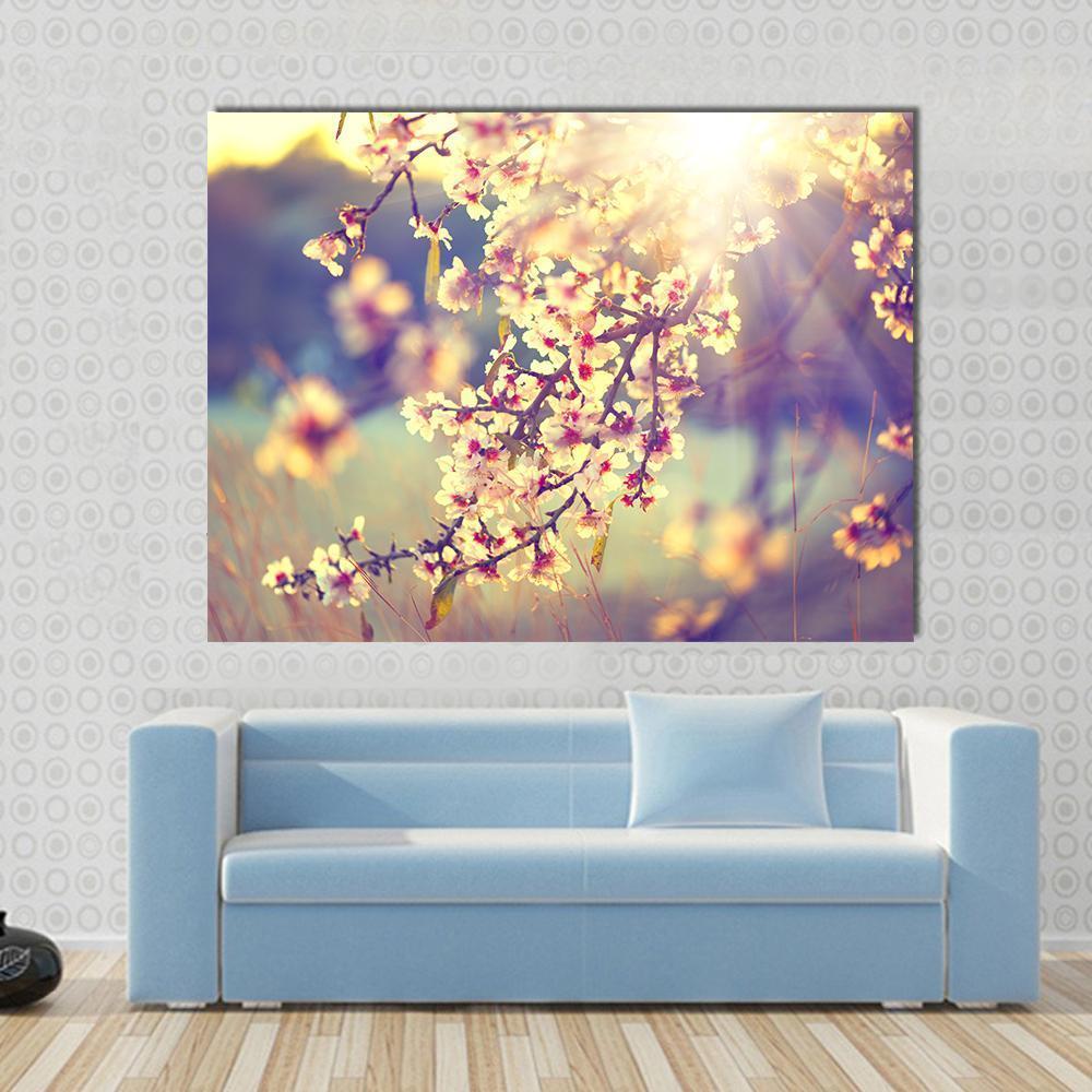 Blooming Tree &amp; Sun Flare Canvas Wall Art in white, yellow and pink, single panel hung on a wall