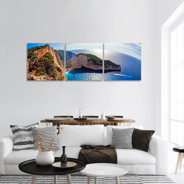 Navagio Beach Cove, Greece Panoramic Canvas Wall Art in white, brown and blue, hung on a wall