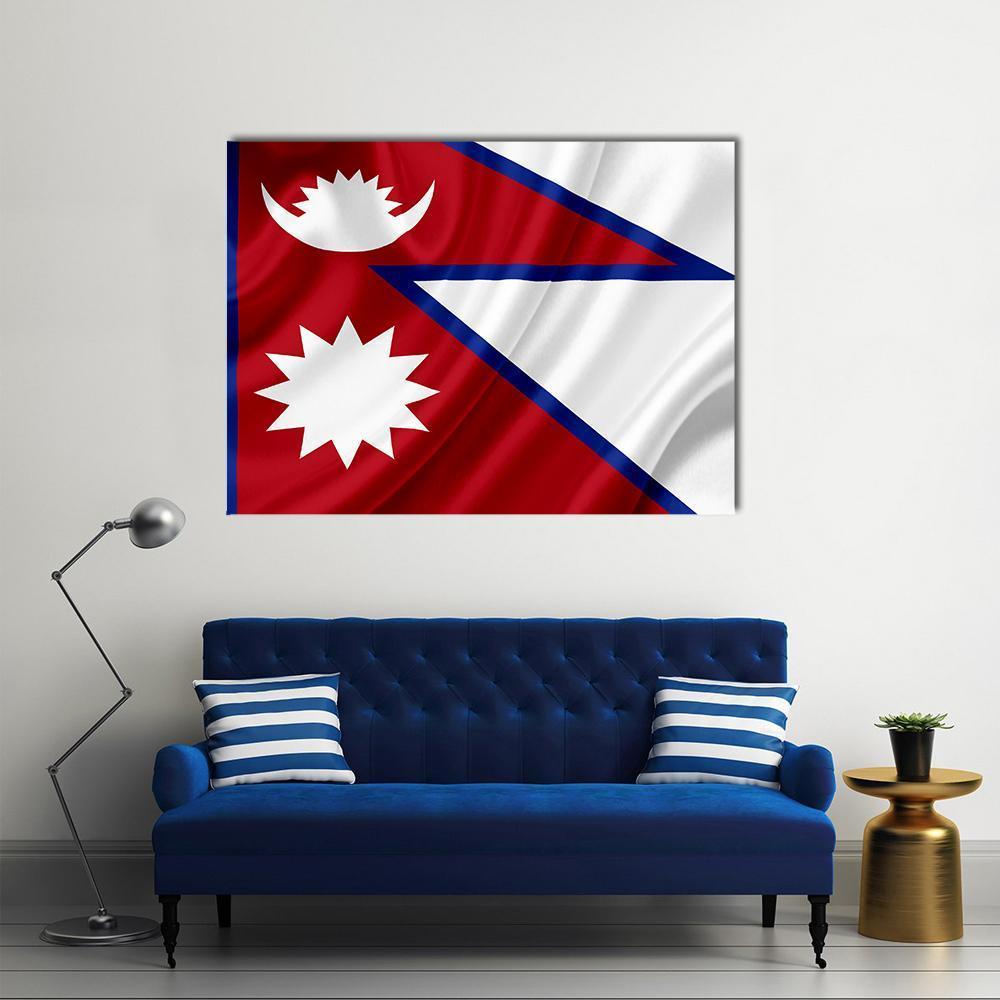Waving Nepal Flag Canvas Wall Art in white, red and blue, single panel hung on a wall