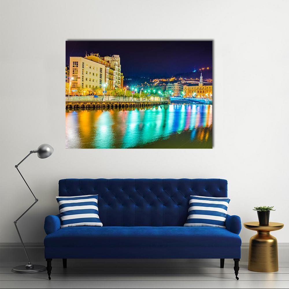 Nervion River at Night Canvas Wall Art in black, yellow and blue, single panel hung on a wall