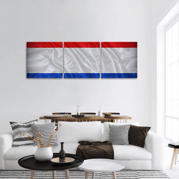 Netherlands Flag with Rippled White Stripe Panoramic Canvas Wall Art in white, red and blue, hung on a wall