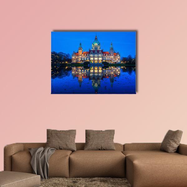 New City Hall in Hanover at Twilight Canvas Wall Art in orange, yellow and blue, single panel hung on a wall