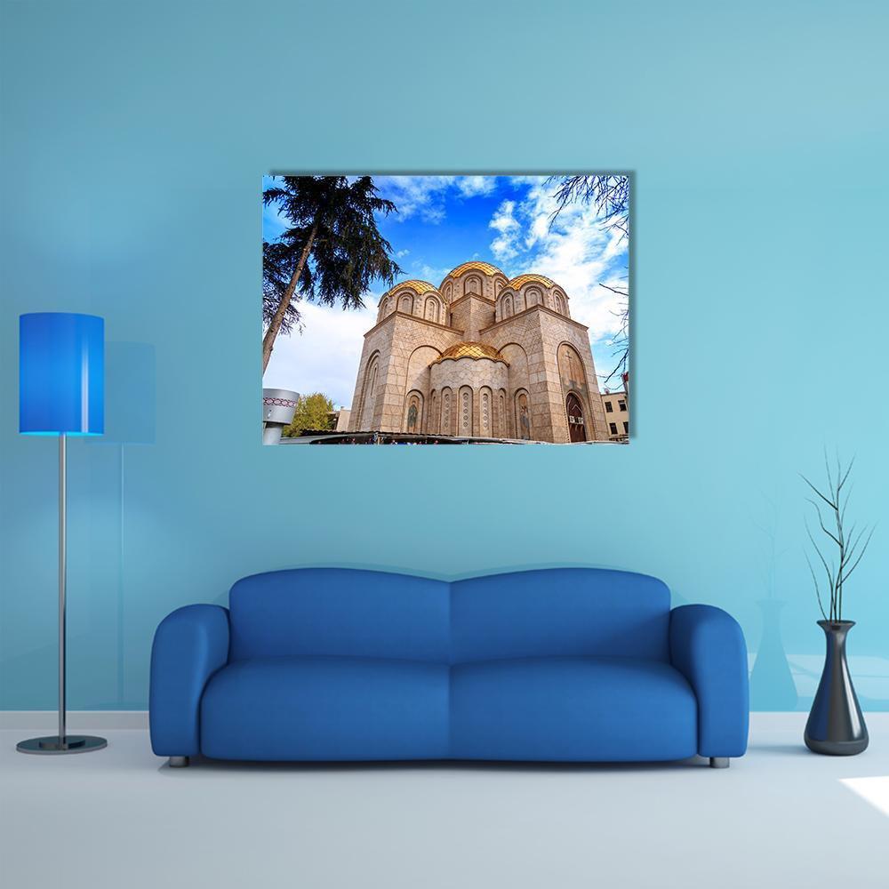 Orthodox Church with Golden Onion Domes Canvas Wall Art in beige, gold and blue, single panel hung on a wall