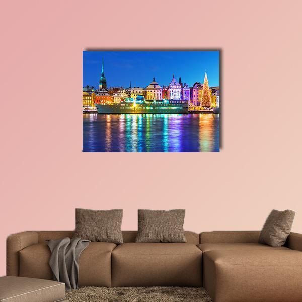 New Year in Stockholm Canvas Wall Art in yellow, blue and multicolor, single panel hung on a wall