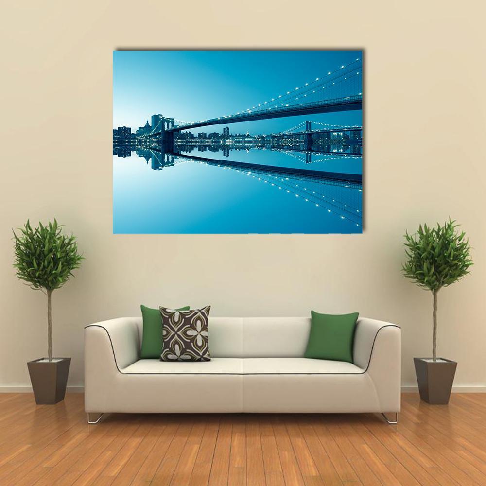 Manhattan Skyline and Brooklyn Bridge Canvas Wall Art in black and blue, single panel hung on a wall
