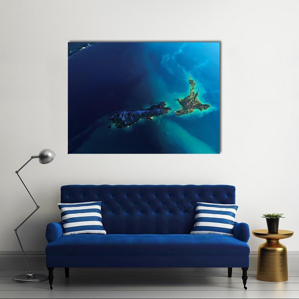 New Zealand from Space Canvas Wall Art in blue and navy, single panel hung on a wall